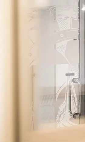 A group of three is happily engaged in conversation.